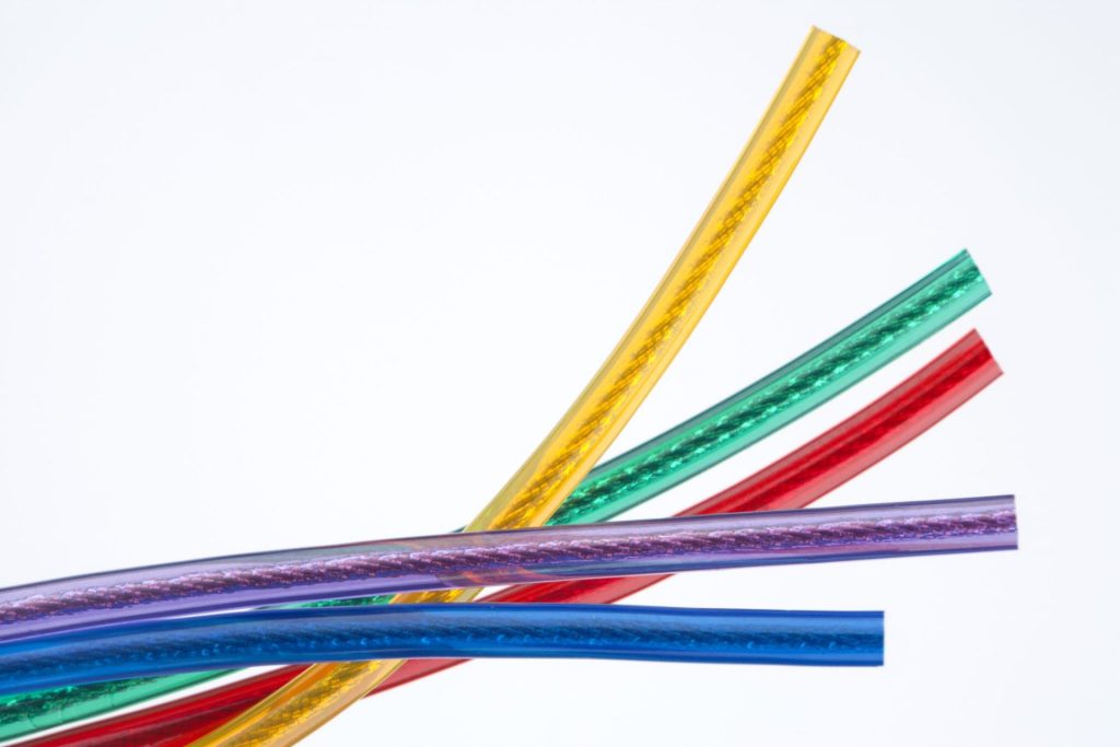 five extruded wire pieces in rainbow colors