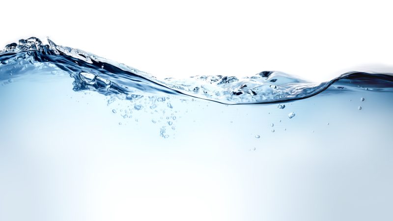 wave of blue water with bubbles